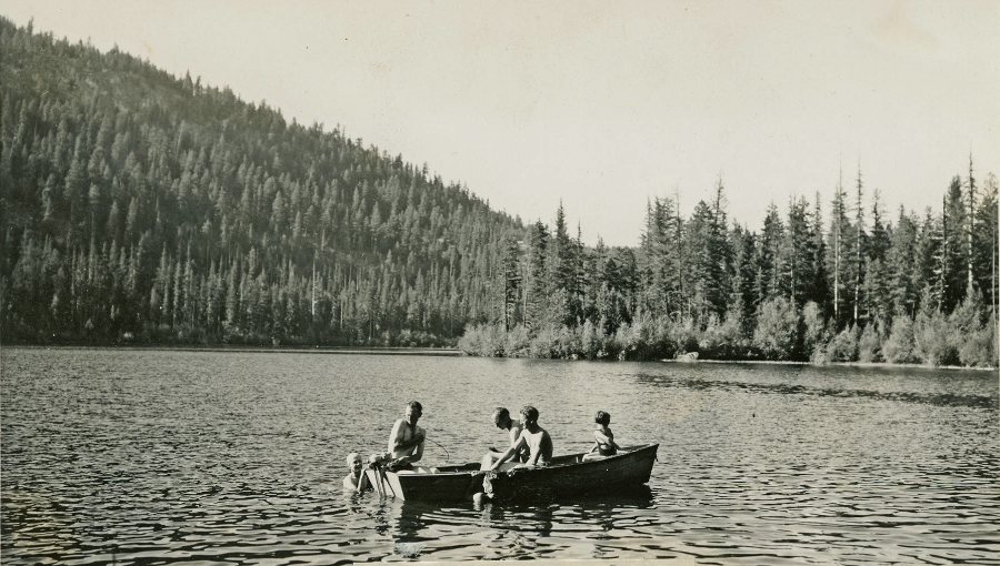 Children in a rowboat on a lake